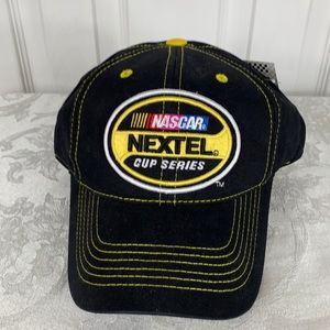 NWT Checkered Flag Sports black and yellow Nextel NASCAR cup series. Velcro back